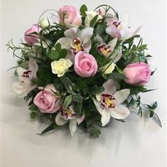 Pink orchid and pink roses posy