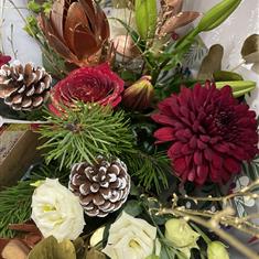 A Red Leave It To The Florist Hand Tied