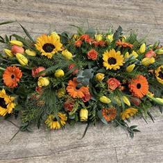 Warm Embrace Casket Spray